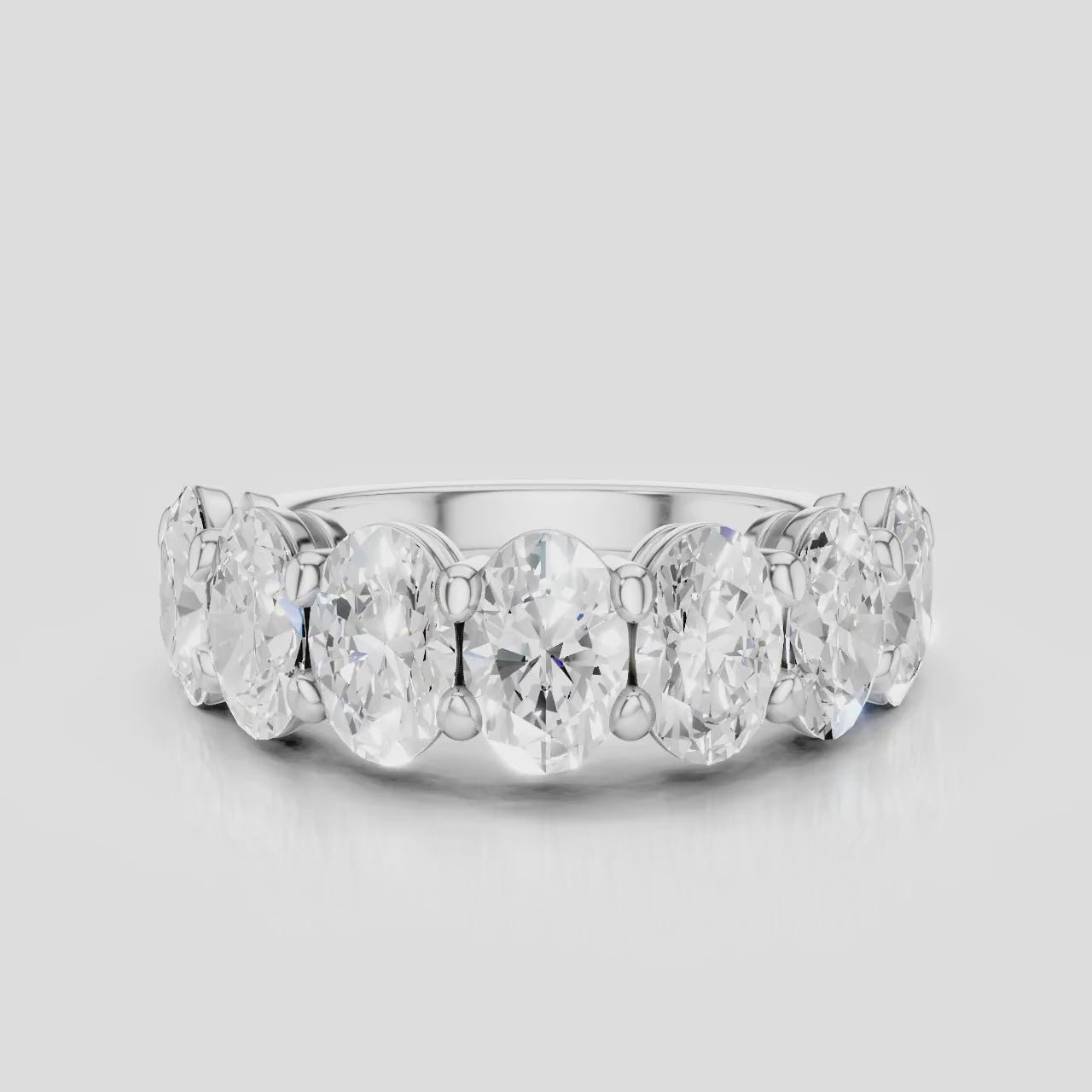 Cler 0.50ct oval half eternity band in 18ct white gold