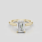 Dover emerald cut solitaire swept shoulder engagement ring in 18ct yellow gold
