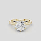 Cambon round brilliant six claw solitaire swept shoulder engagement ring in 18ct yellow gold