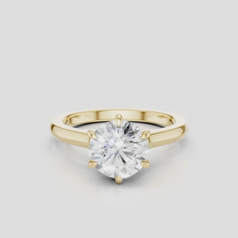 Cambon round brilliant six claw solitaire swept shoulder engagement ring in 18ct yellow gold
