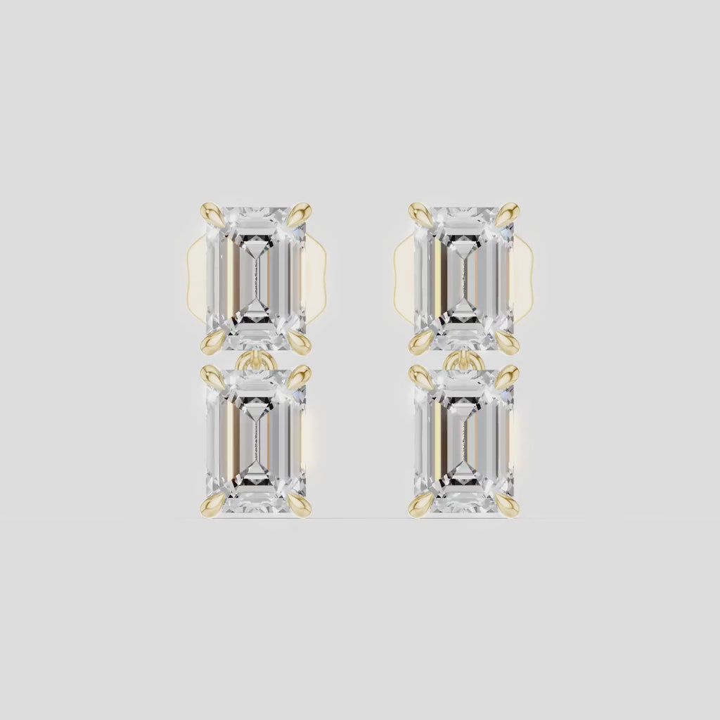 Charlot double 0.50ct emerald cut drop earrings in 18ct yellow gold