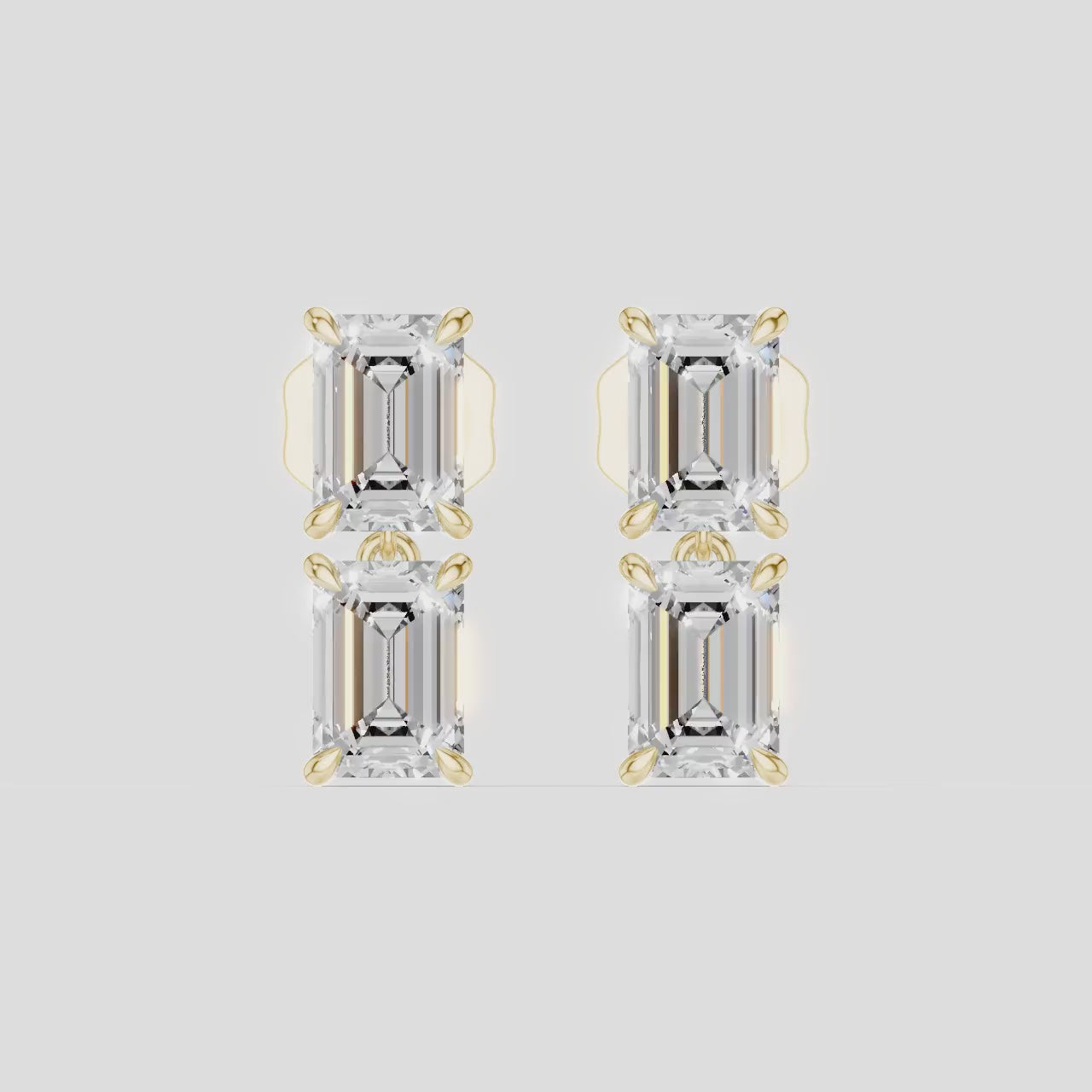 Charlot double 0.50ct emerald cut drop earrings in 18ct yellow gold