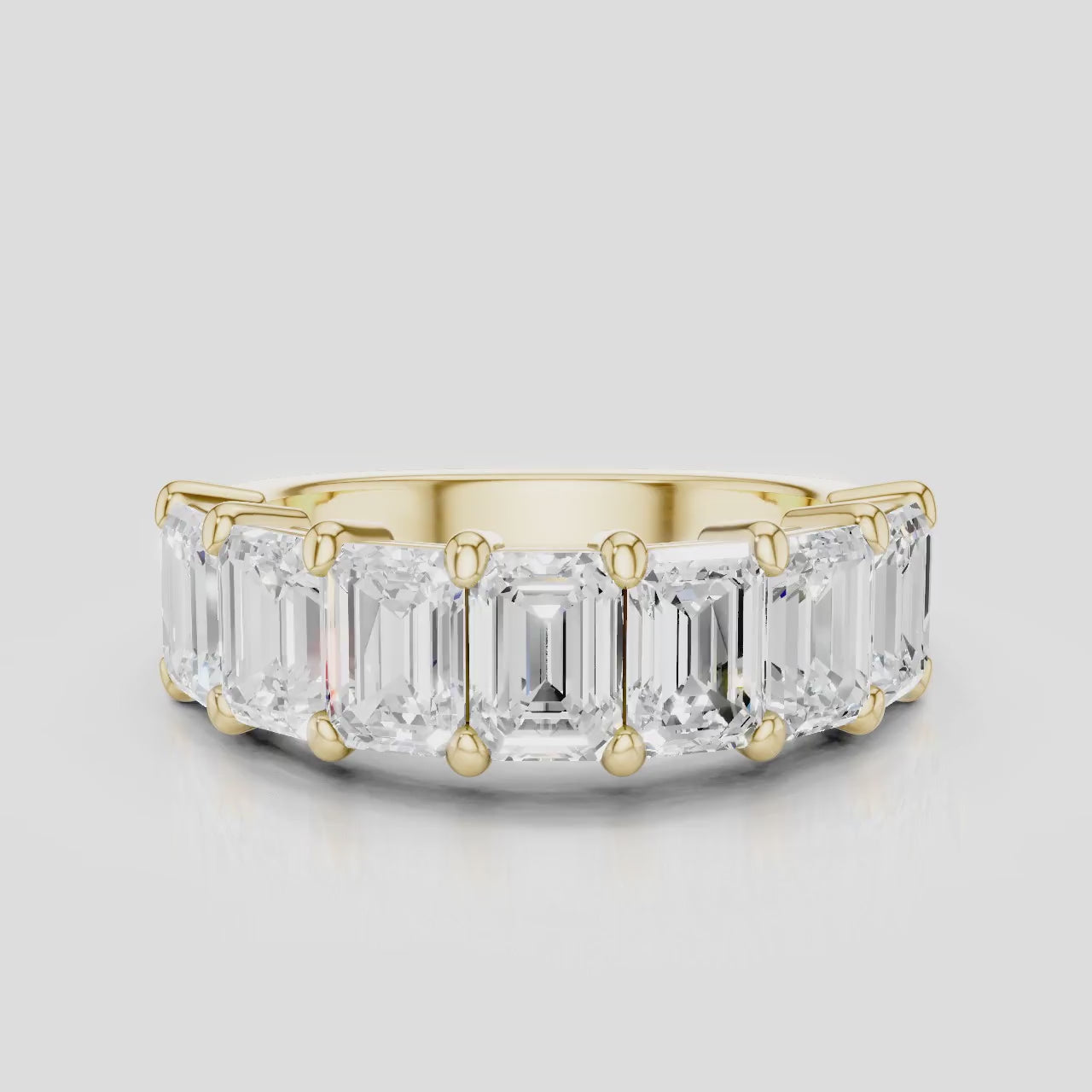 Soho 0.50ct emerald cut half eternity band in 18ct yellow gold