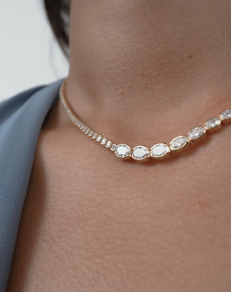 Model wears Mateo Semi bezel graduated necklace in 18ct yellow gold