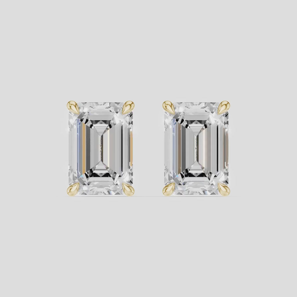 Clark 2ct emerald cut diamond studs in 18ct yellow gold