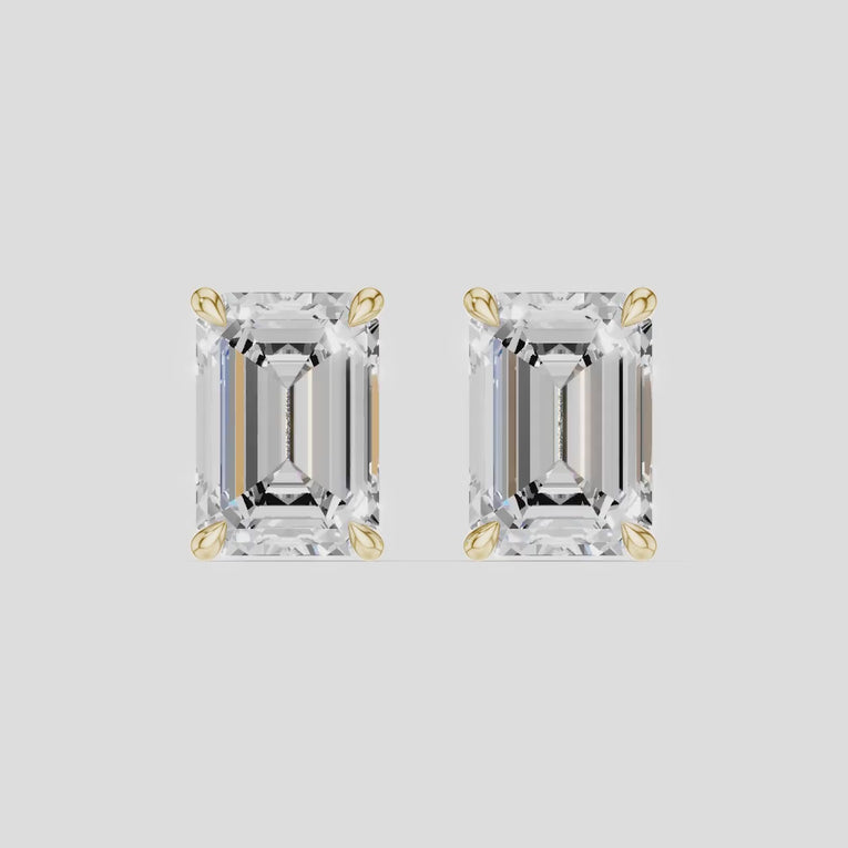 Clark 2ct emerald cut diamond studs in 18ct yellow gold
