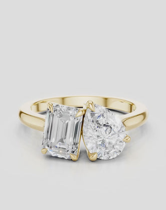 Kinney Toi Et Moi pear emerald engagement ring in 18ct yellow gold