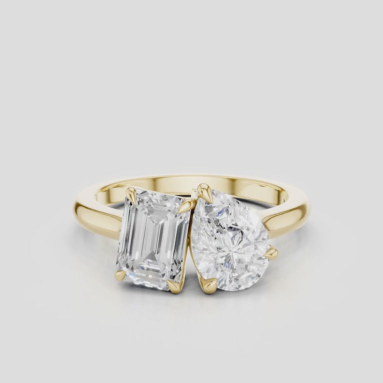 Kinney Toi Et Moi pear emerald engagement ring in 18ct yellow gold