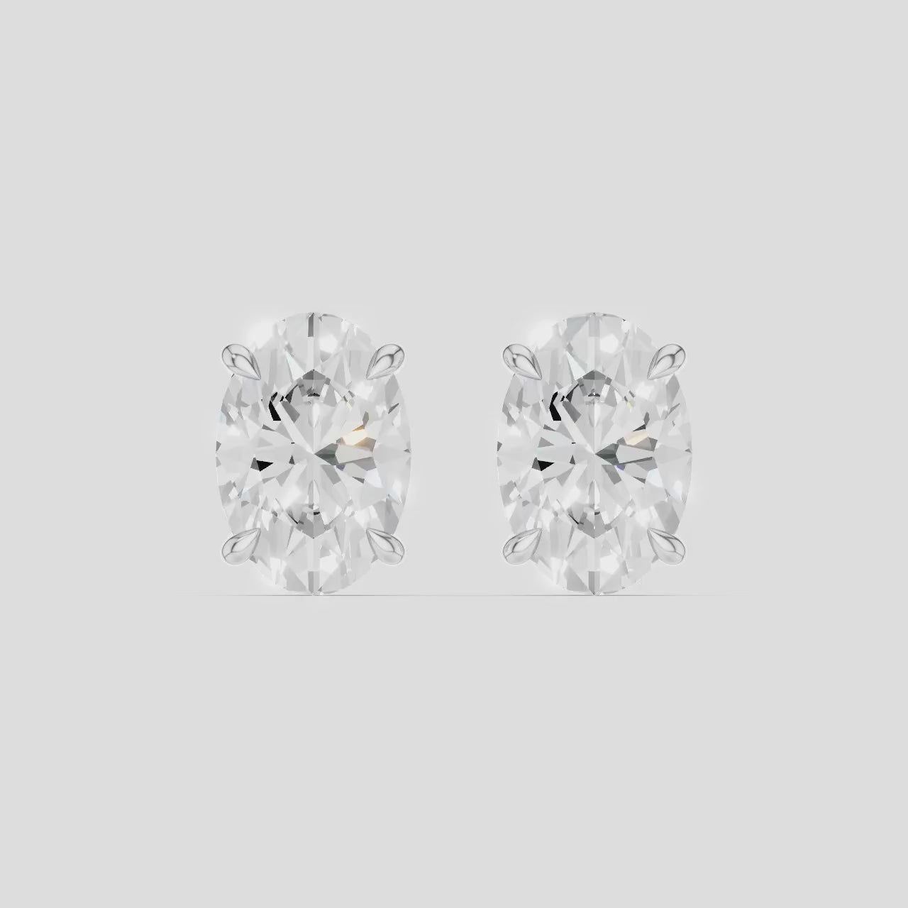 Madison 1ct oval cut diamond studs in 18ct white gold