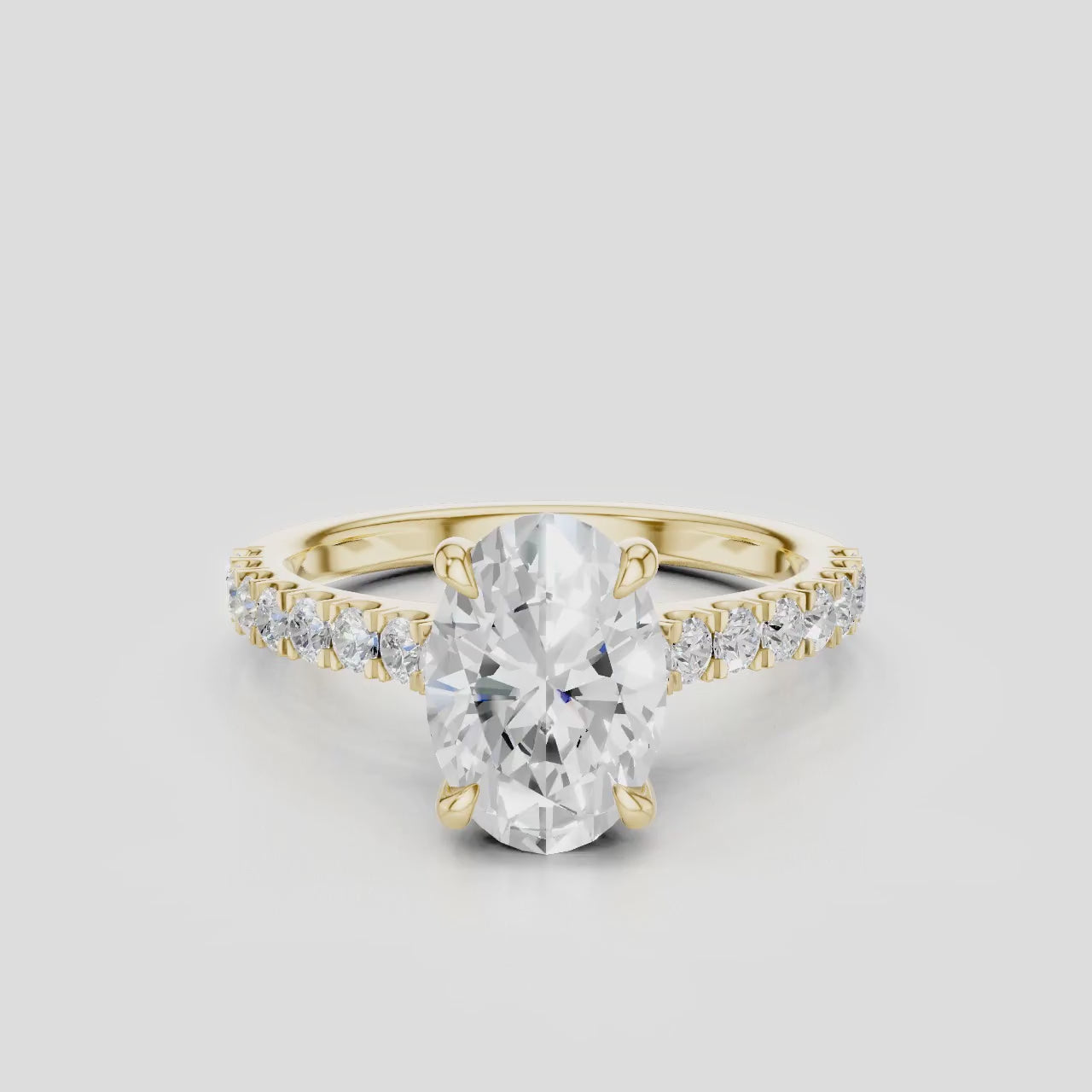 Nassau oval cut diamond band engagement ring in 18ct yellow gold